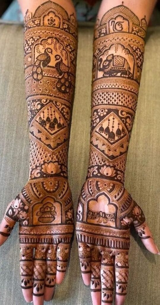 Traditional Rajasthani bridal mehndi design with intricate motifs covering full hands and arms.