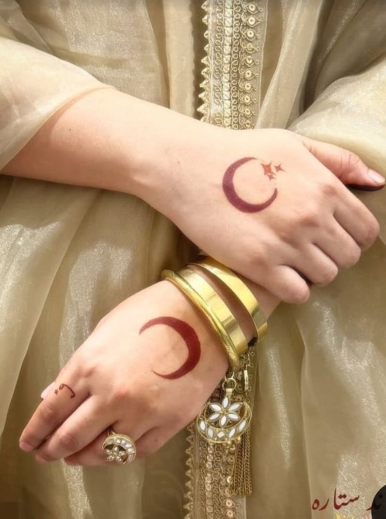 Mehndi Design for Eid: Minimal crescent Eid Mehndi design on hand – simple and elegant festive mehndi pattern
